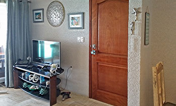 Isla Mujeres vacation rentals,  sailfish condo #402 entrance and entertainment center